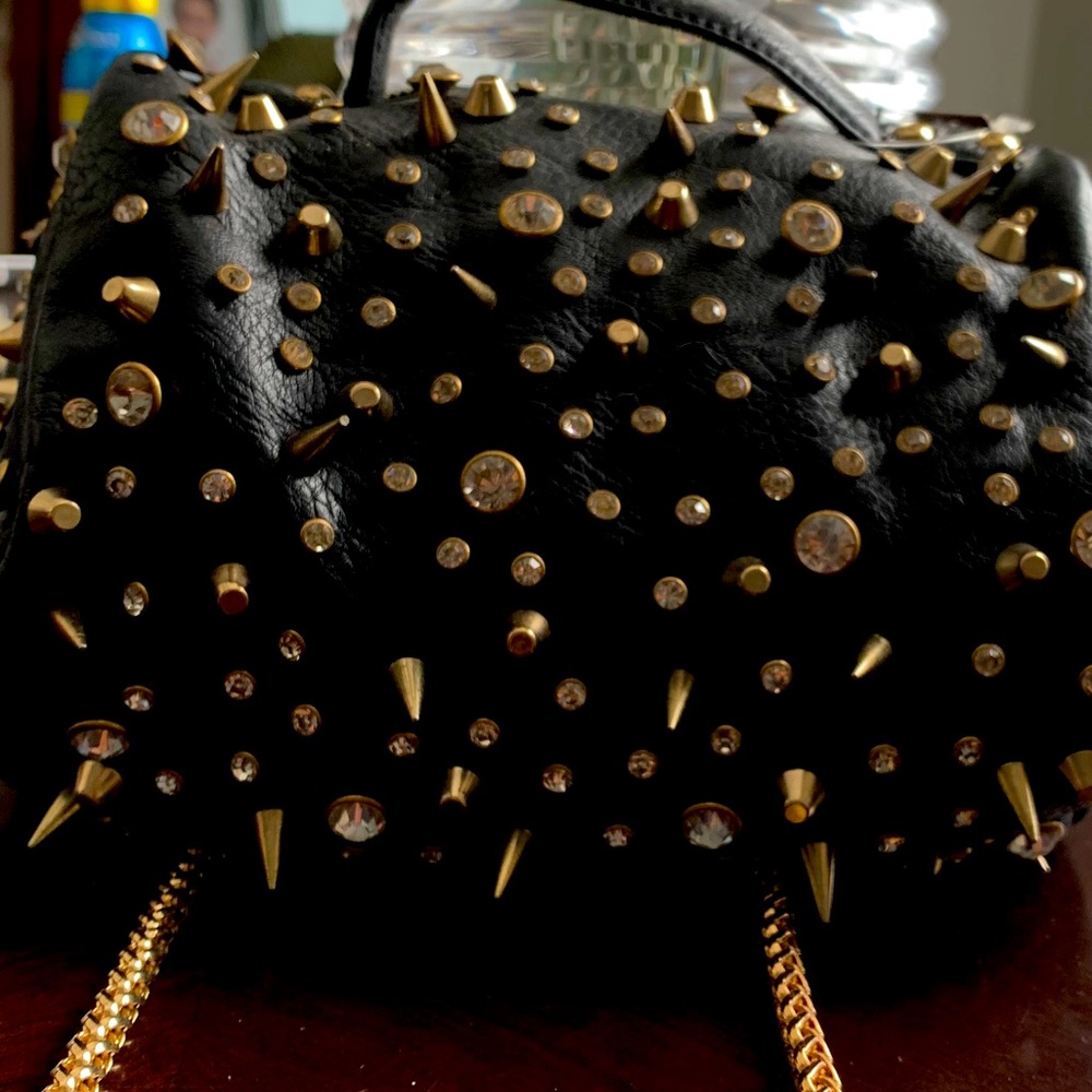 black studded faux leather purse